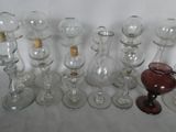 a lot of wine glasses that are sitting on a table