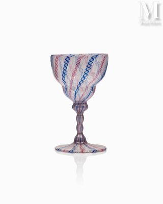 a wine glass with a red, white, and blue design on it