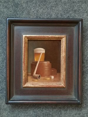 la photo d'une photo représentant une tasse et une cuillère, dans un cadre