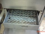 an image of a metal drawer with a metal tray inside of it