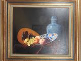a picture of a painting of fruit and a vase on a table