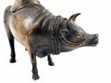 a statue of a boar with a hat on it ' s head