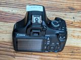 a camera that is sitting on a wooden table