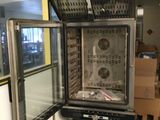 a machine that has some food inside of it