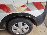 a white car with a red and white stripe on the side of it