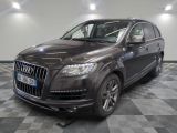 an image of a black audi suv parked in a garage