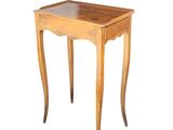 a small wooden table with a glass top on a white background