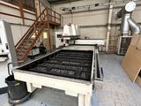 a large machine that is sitting inside of a building