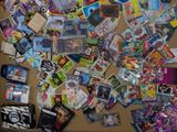 a large pile of comic books on a table