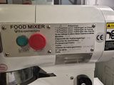 an image of a food mixer in a kitchen