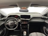 a dashboard of a car with a steering wheel and a dash board