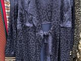 a rack of clothes that is on display in a store
