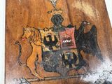 a picture of a painting of a horse and a lion on the wall