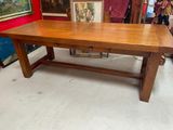 a large wooden table in the middle of a room