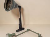 an image of a lamp and a pair of pipes on a table
