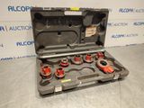 a set of tools in a case sitting on a table