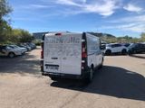 a white van that is parked in a parking lot