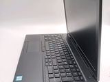 a laptop computer that is sitting on a table