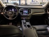 the interior of a car with a steering wheel, dashboard, and touch screen