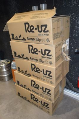 several boxes stacked on top of each other in a room