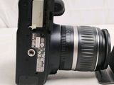 a close up of a camera with a lens attached to it