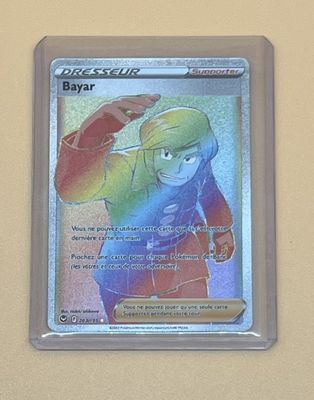 une photo d'une carte Pokémon sur laquelle figure l'image d'un garçon