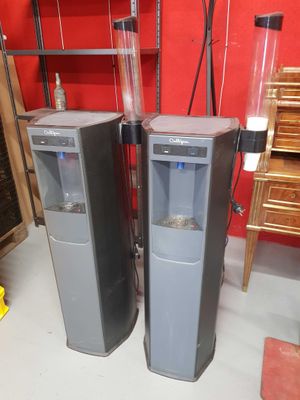 two water dispensers that are next to each other