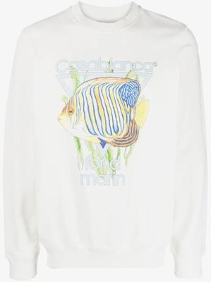 un sweat-shirt blanc orné d'une image de poisson