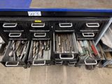 a close up of a drawer full of tools in a warehouse