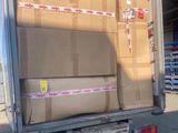 a truck that has some boxes in the back of it