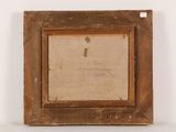an old picture frame with a picture of a key on it
