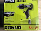 a box of a cordless power drill sitting on top of a wooden table