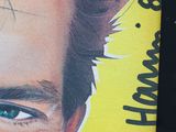 a painting of a man with a mustache on the cover of a magazine