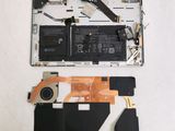 a picture of a laptop with a broken battery