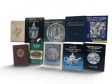 a lot of books that are sitting on a table