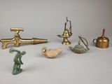 a lot of small figurines that are on a table