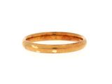 a close up of a gold ring on a white background