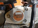 a close up of a motorcycle with a number plate on it