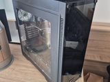 a computer case sitting on top of a wooden desk