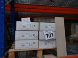 many boxes that are stacked on a pallet in a warehouse