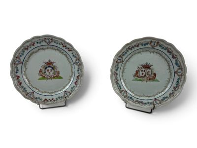 two plates with a picture of a man and a woman on them