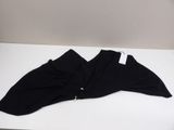 a close up of a pair of black pants on a white table