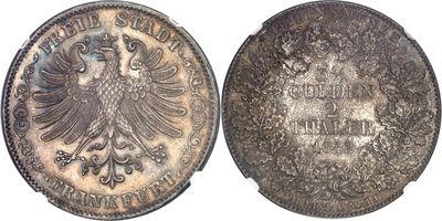 a close up of a coin with an eagle on it