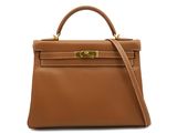 a brown leather handbag on a white background