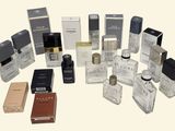 many different types of perfumes on the table