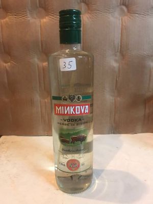 a bottle of vodka that is sitting on a table