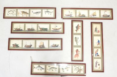 many framed pictures on the wall of a room
