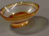 a glass bowl that is sitting on a table