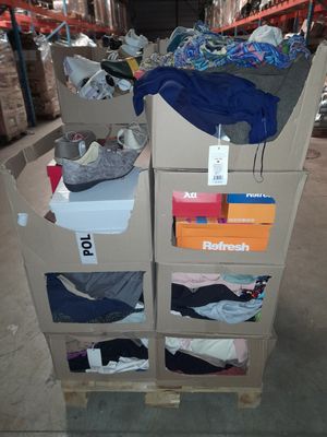 a cart with a lot of clothes on it