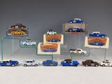 a lot of toy cars on display in a display case